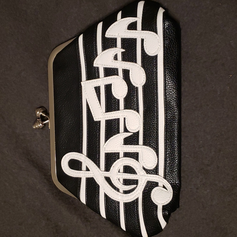 Far Nine Music Note Clutch